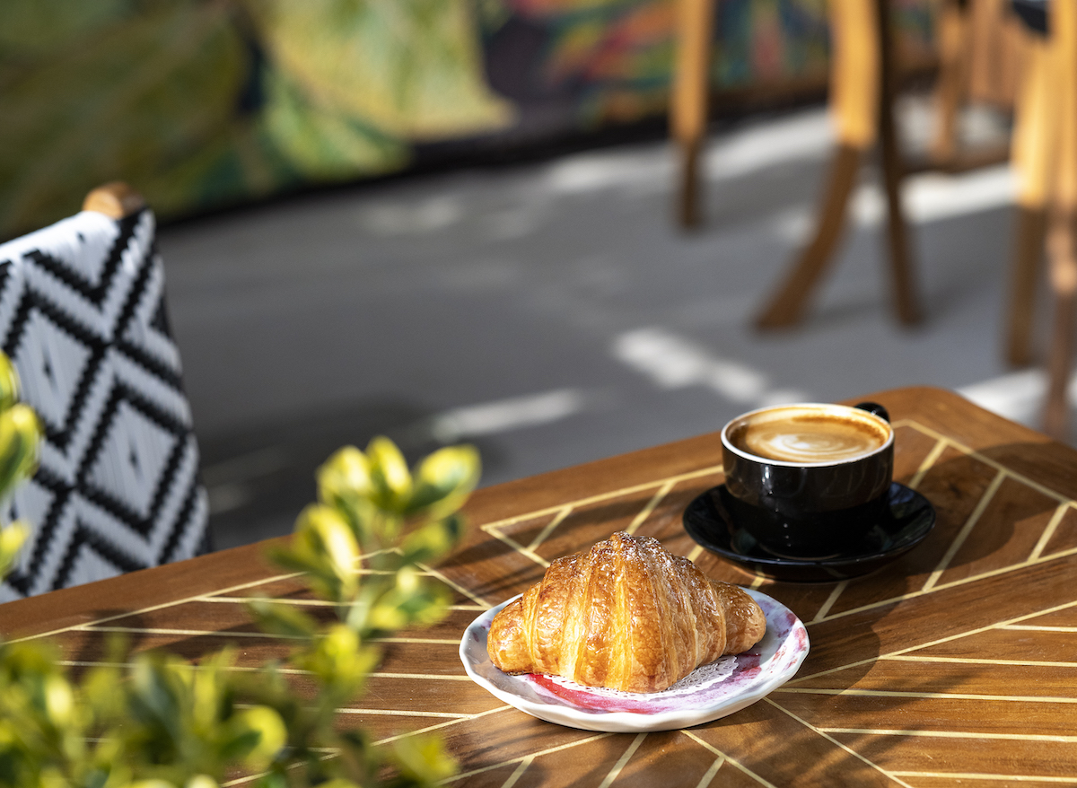 A quiet latte and croissant moment at the Reading Room. | Photo by Cati Teague