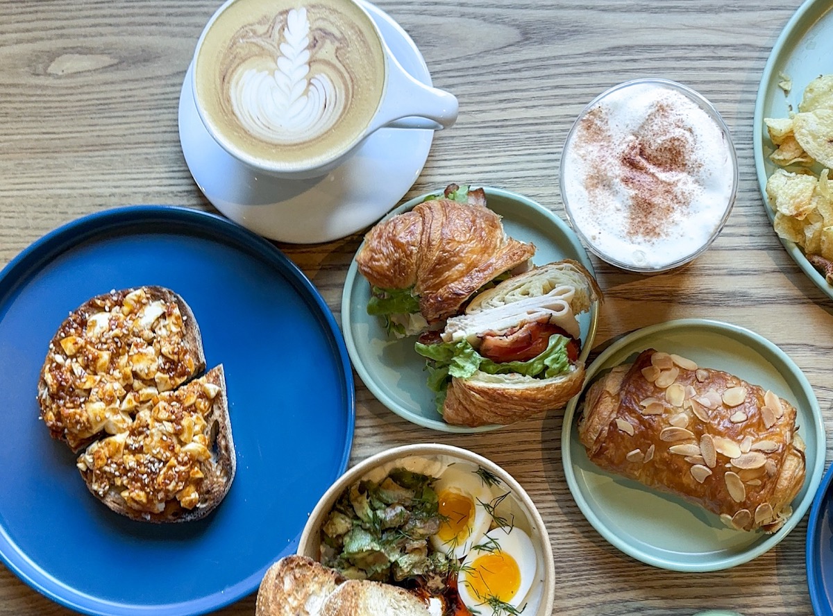 A coffee and breakfast spread at Sidecar Coffee. | Photo by Leigh Heymann
