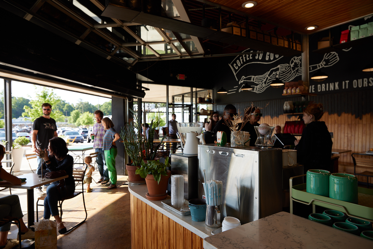 The coffee counter and patio seating at Spiller Park Coffee - Toco Hills. | Photo by Sophia Van Dyk Photography