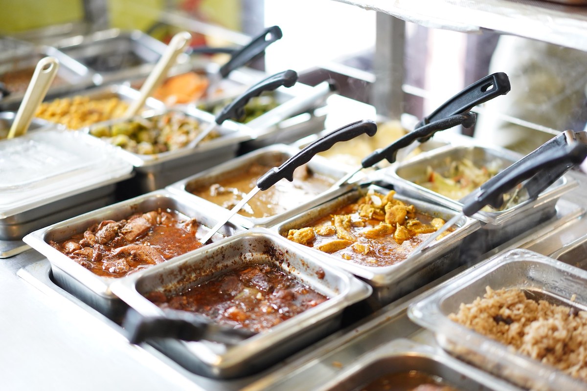 The 12 featured dishes at Tassa's Roti Shop. | Photo by Tassa's Roti Shop