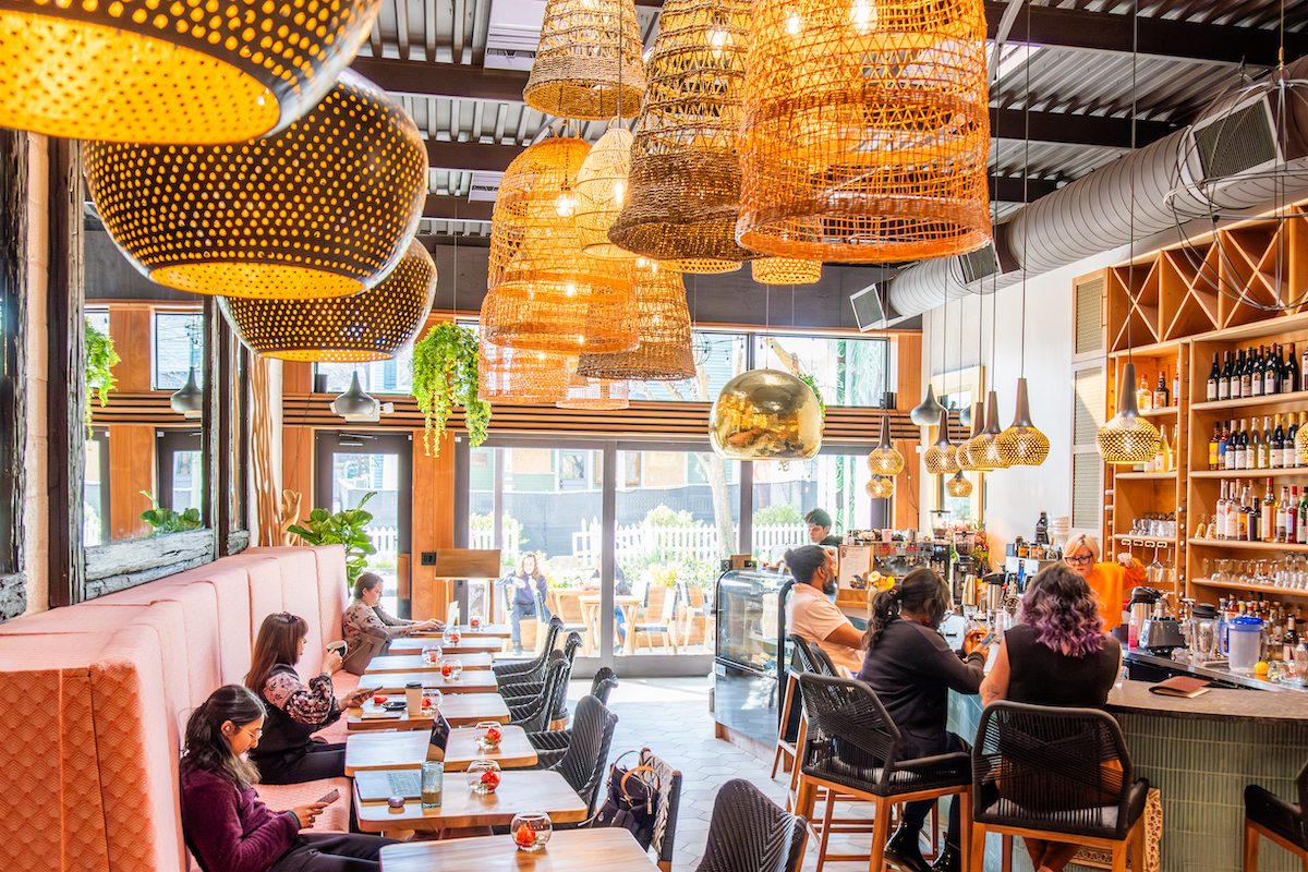 The light-filled dining room and bar at the Reading Room. | Photo by Cati Teague