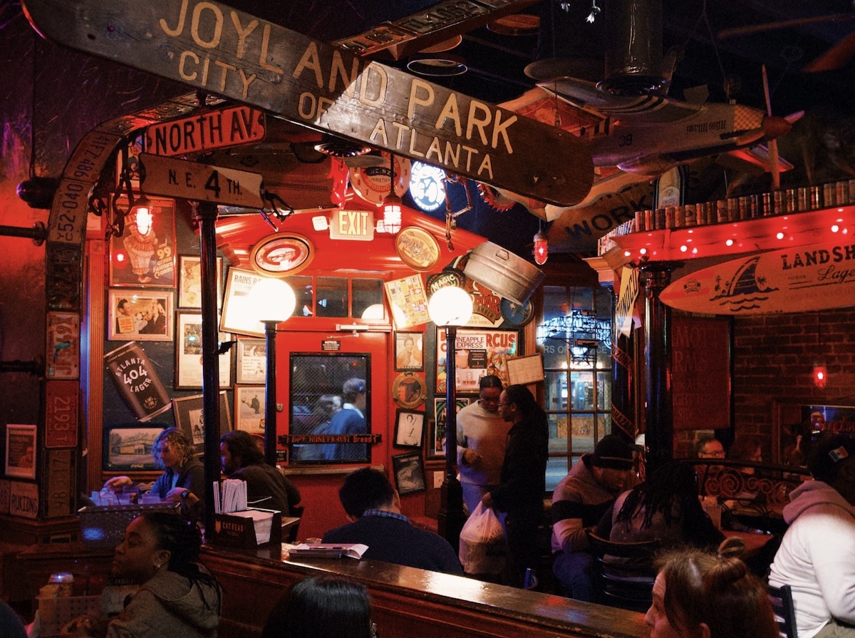 Red neon-lit interiors of the Vortex. | Photo by the Vortex