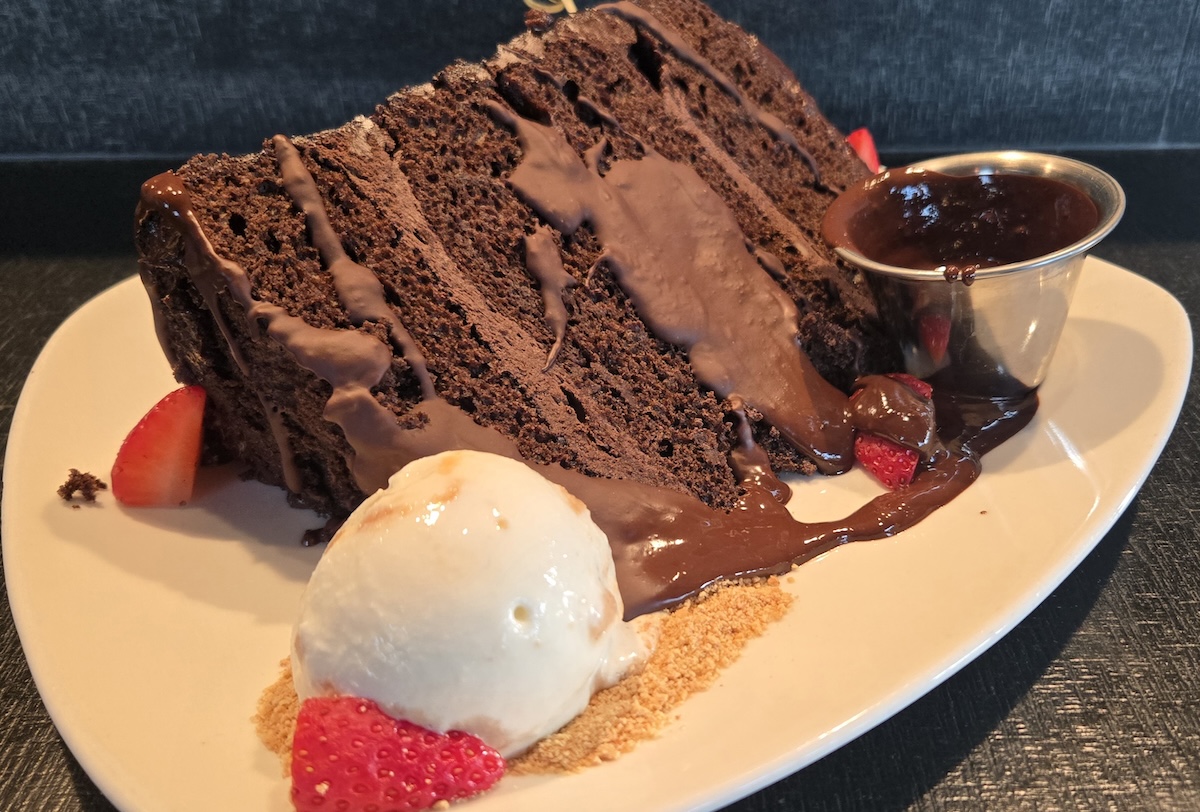 This chocolate cake could feed an army, in the best way. | Photo courtesy of Agave Blue Cantina