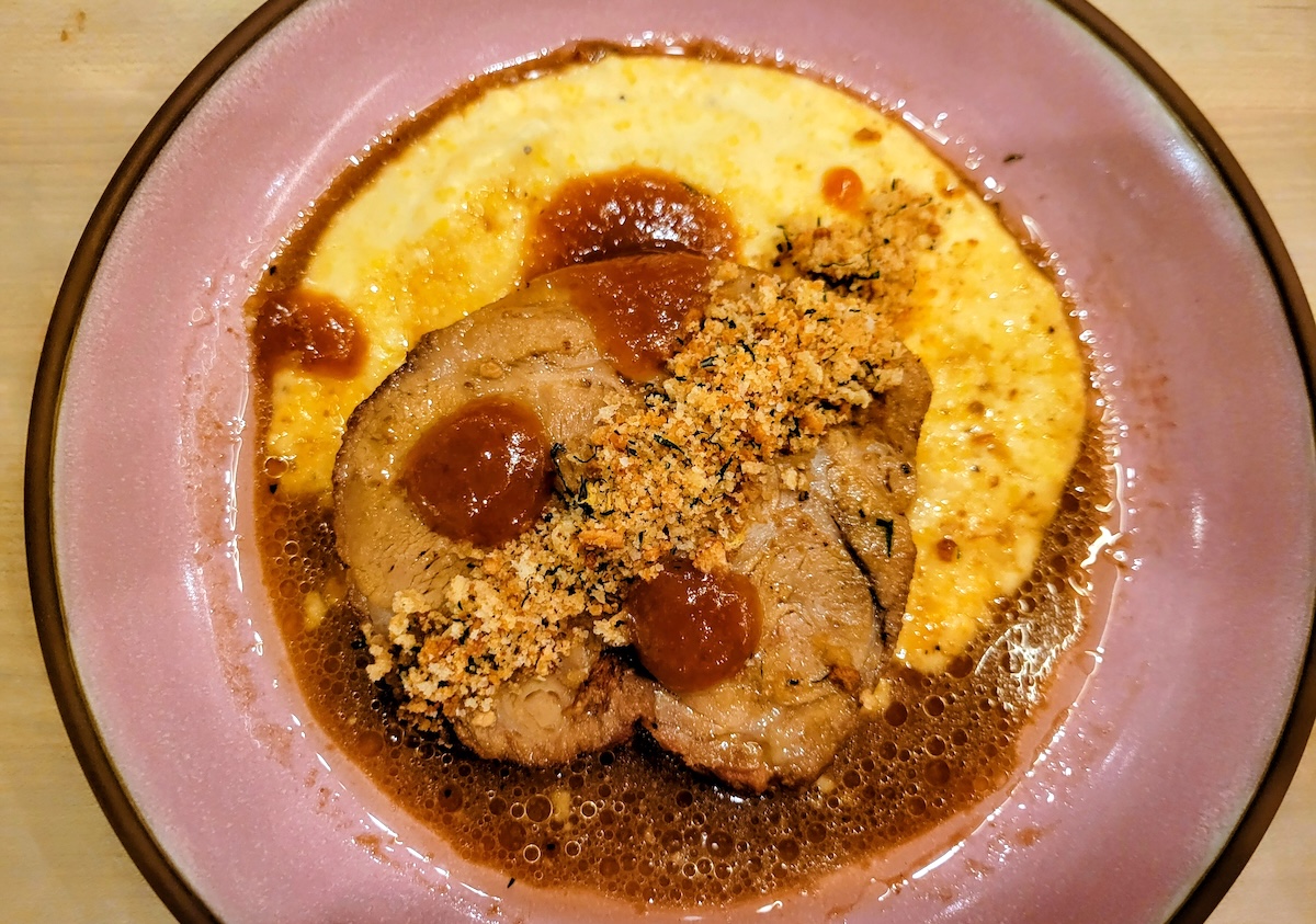 The milk-braised pork shoulder entree at Dear Emilia. | Photo by Linnea Covington