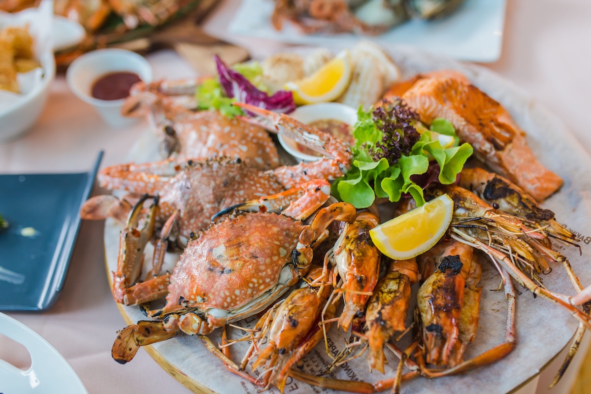Picture of A delicious seafood at luxury restaurant. A plate of fresh seafood with shrimps, prawns, crabs, salmon, squid and mussels By: akkalak ID: 164671057
