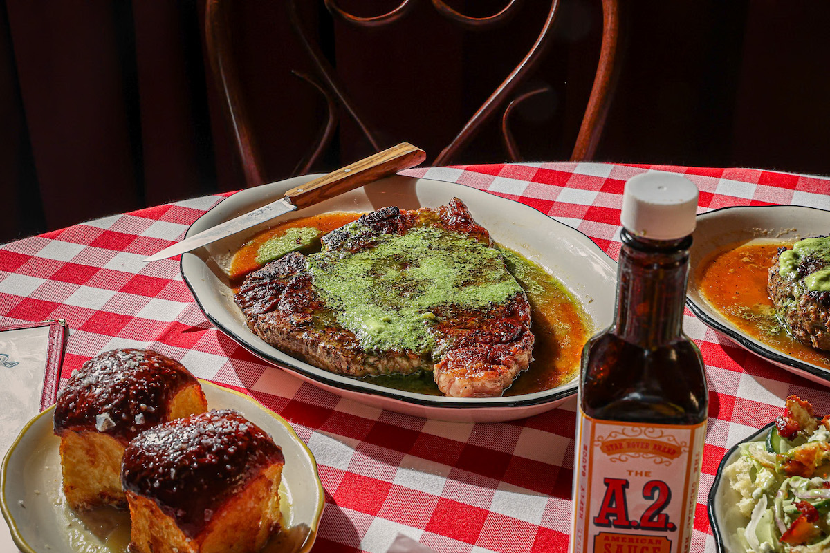 Steak dinner with milk rolls and a house salad at Star Rover. | Photo by Star Rover