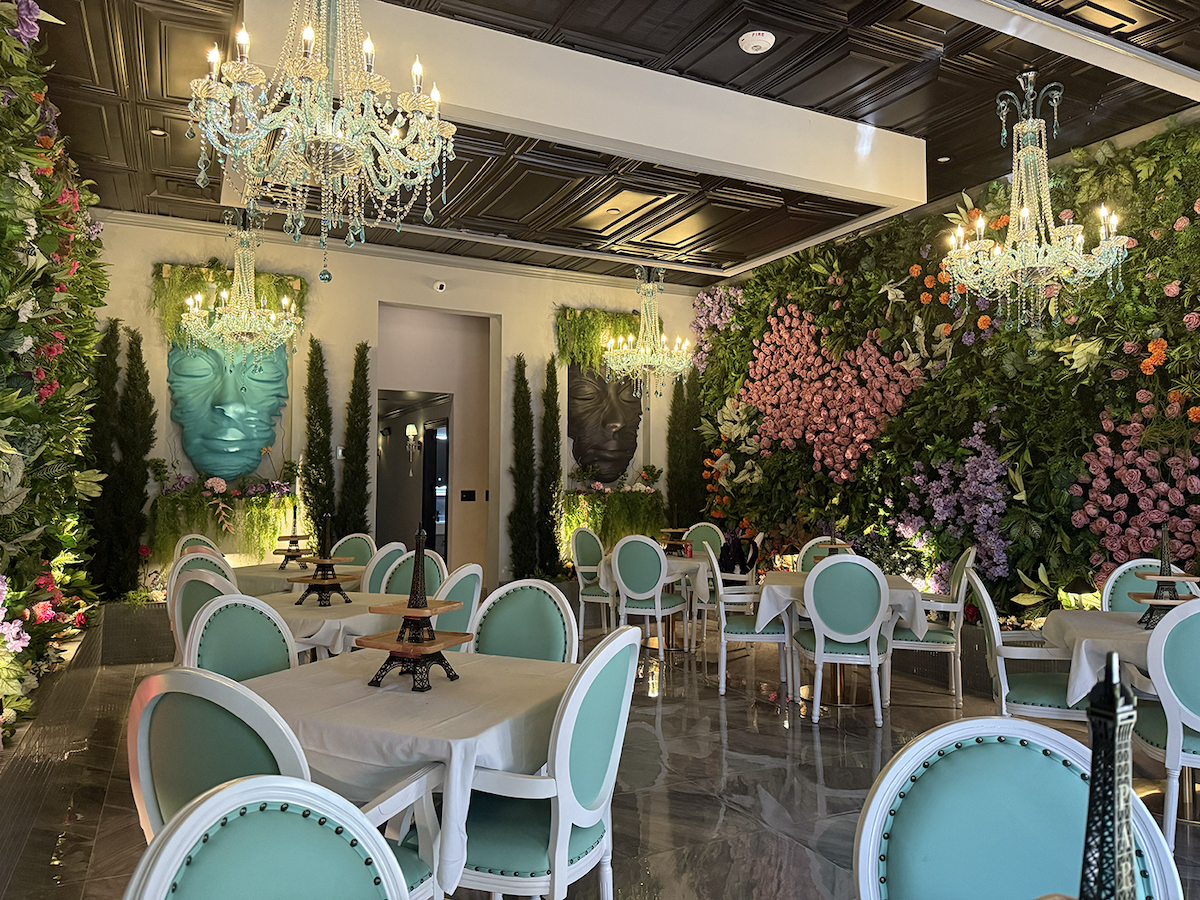 The chandelier-bedecked dining room at La Parisienne French Bistro. | Photo by La Parisienne French Bistro
