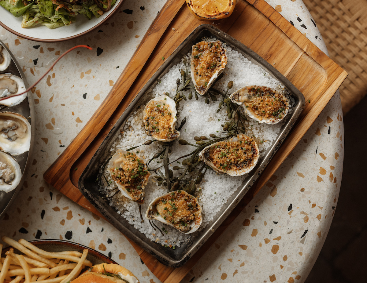 Oysters and other brunch offerings at Carmel. | Photo by Oliva Restaurant Group