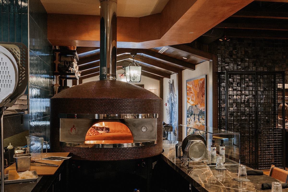 The cherry wood fired pizza oven at Long Weekend. | Photo by Marco Wang