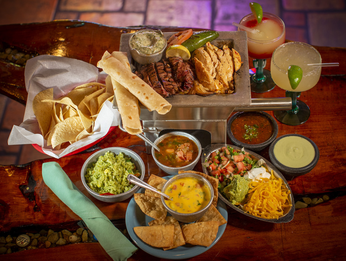Beef and chicken combination fajitas at El Tiempo. | Photo by El Tiempo Cantina