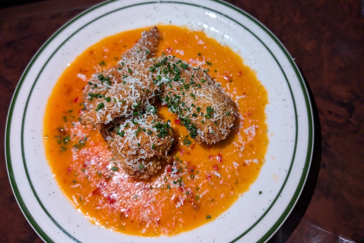 The chicken wing plate comes with two, but mighty, wings. | Photo by Linnea Covington