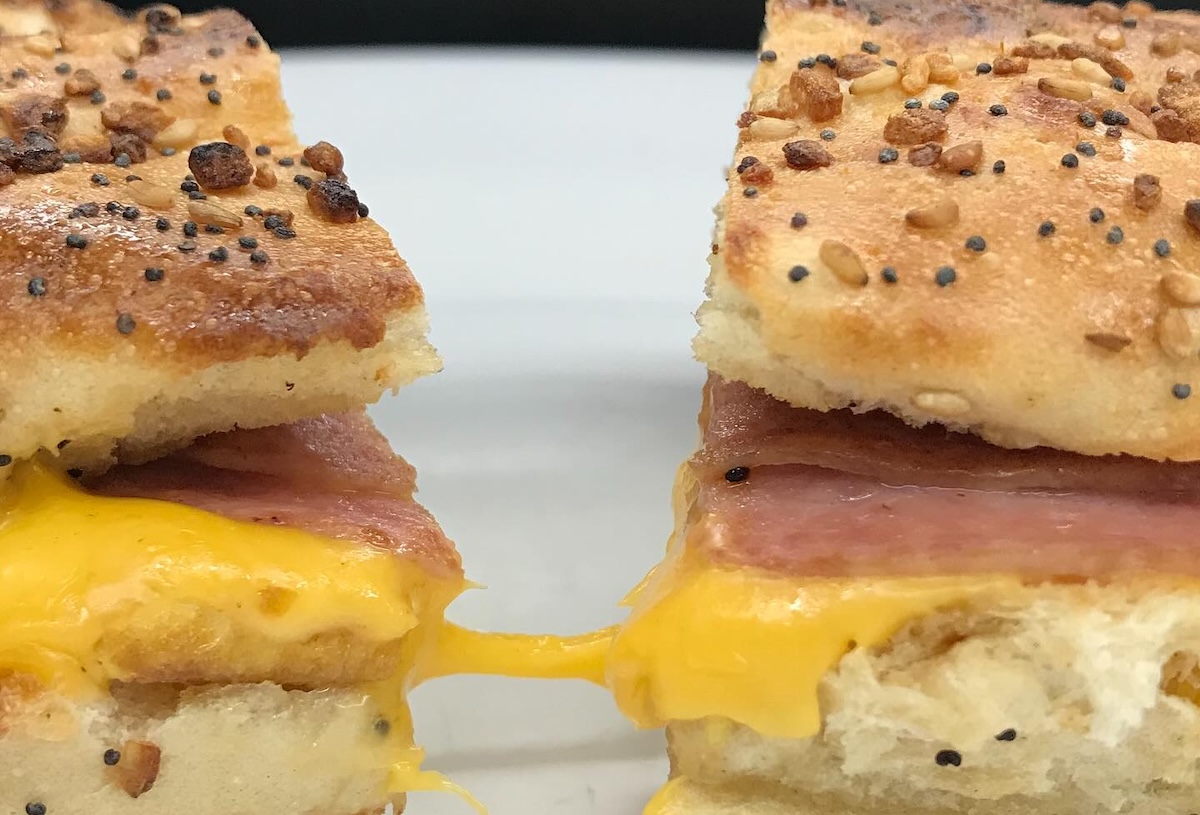 That cheese pull! | Photo courtesy of L&M Delicatessen & Catering