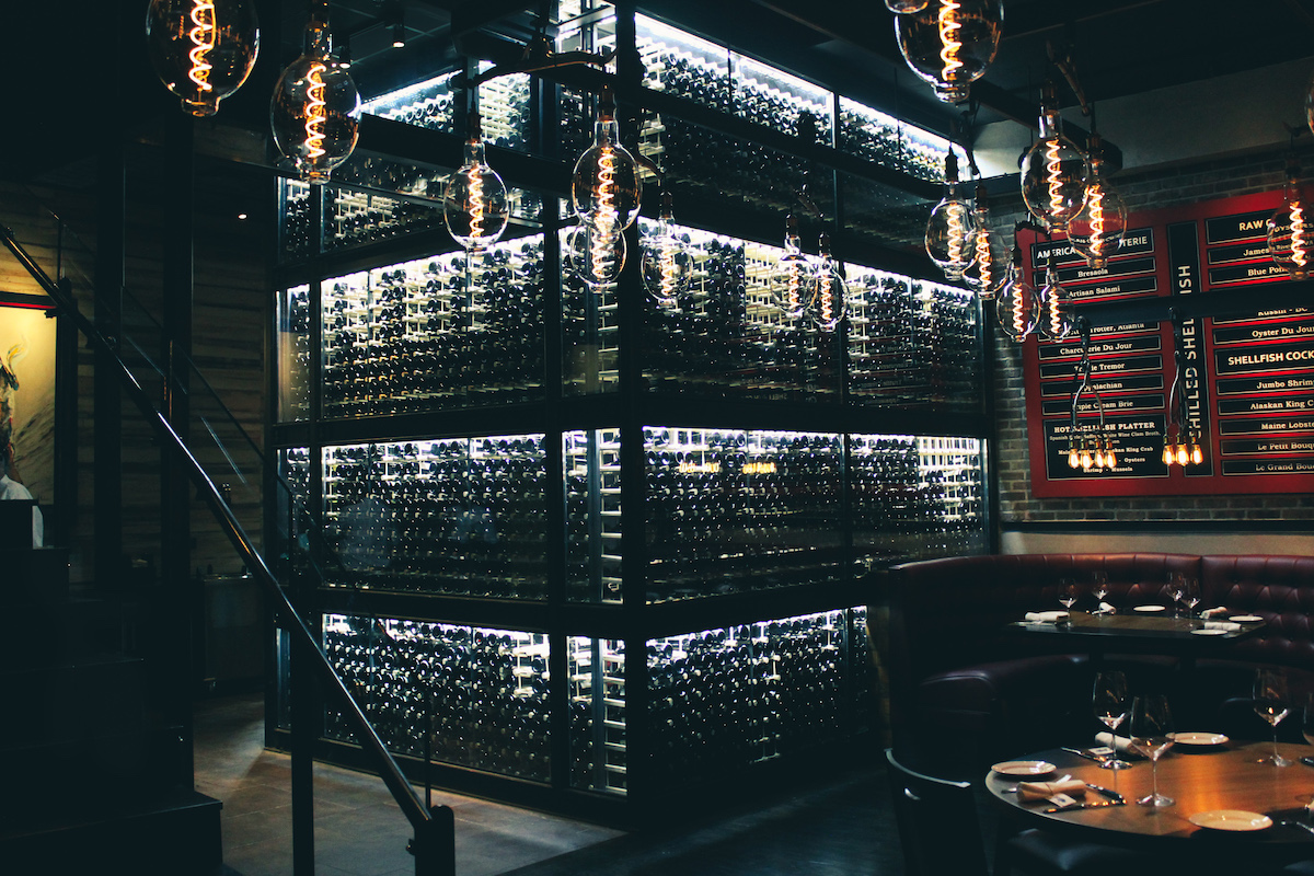 Over 400 bottles of bourbon, whiskey and Scotch are available at Little Alley. | Photo by Little Alley