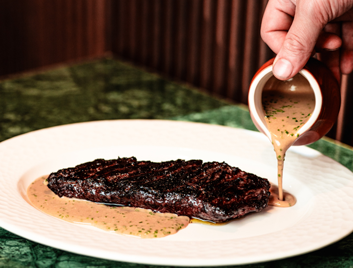 Hanger steak with au poivre sauce at Osteria di Mercato. | Photo by Osteria di Mercato