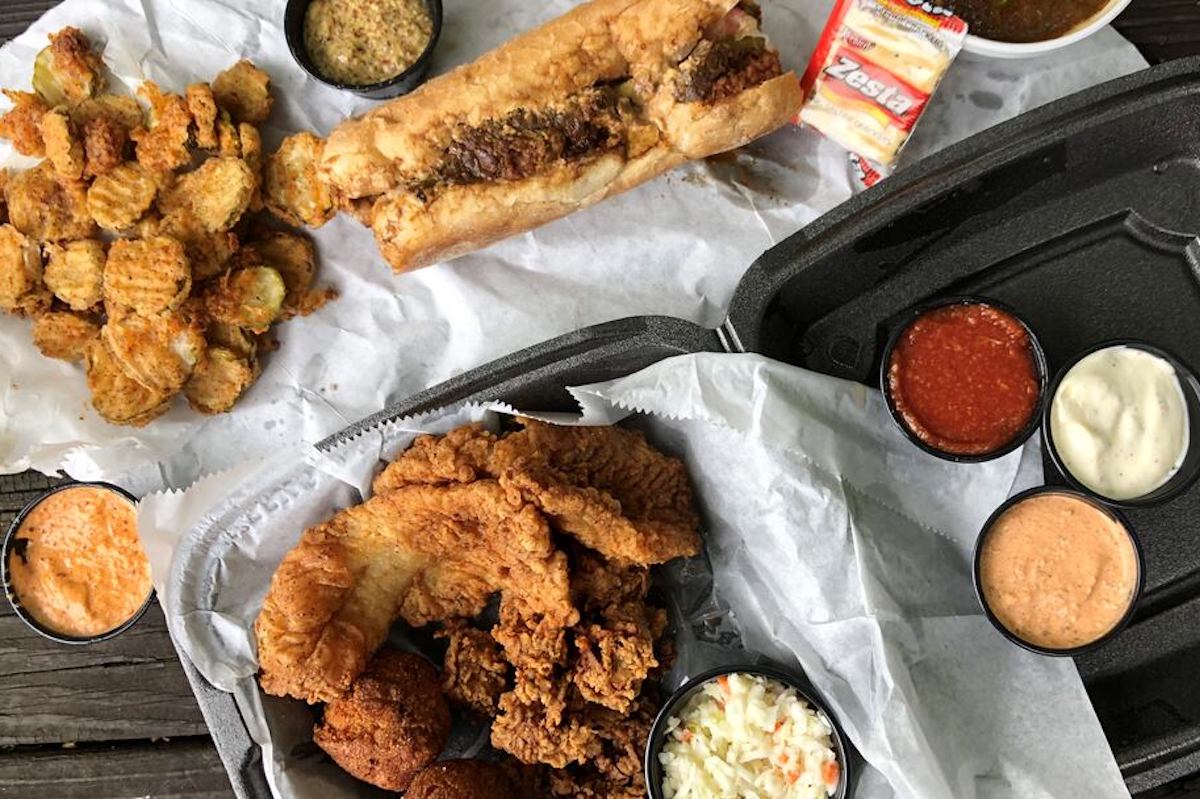 Po'boys and dipping sauces at the Po'boy Shop. | Photo by AJC