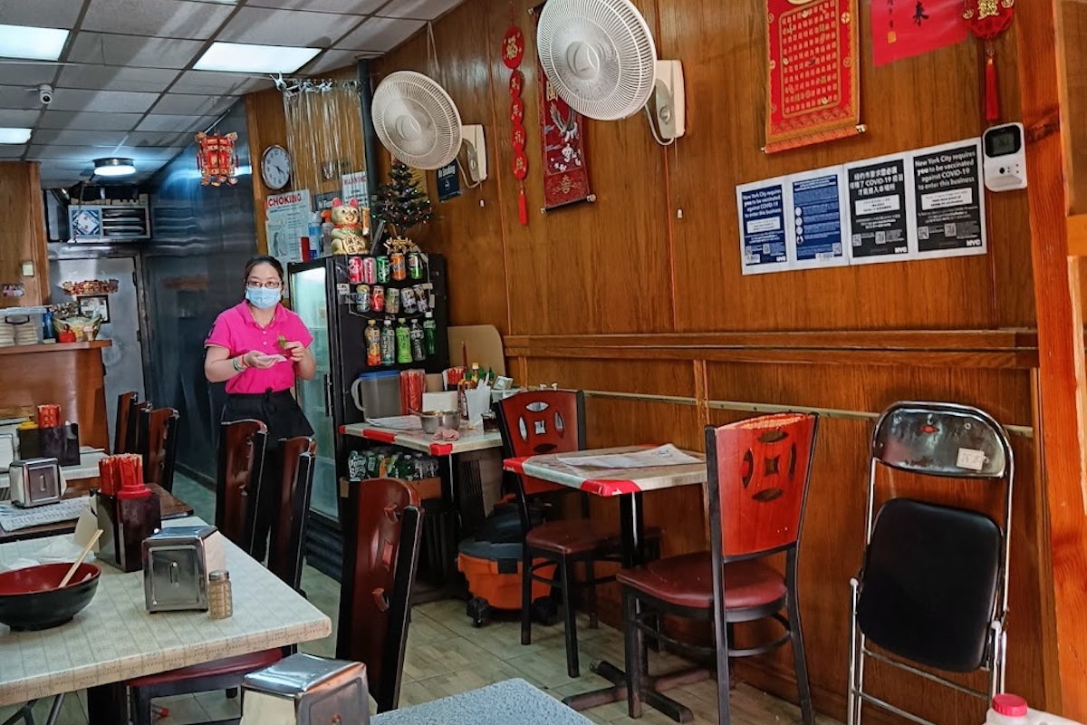 Find a cozy bite at this small restaurant in NYC. | Photo courtesy of Spicy Village
