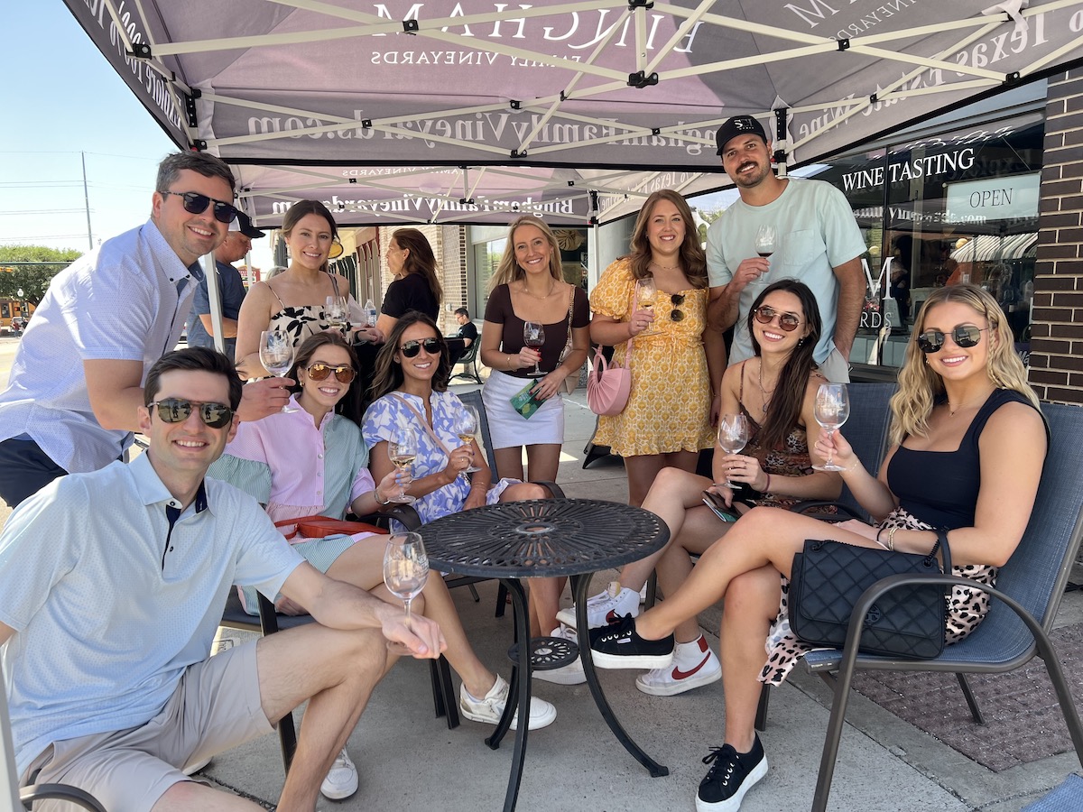 Groups gather to sip wine in historic downtown Grapevine. | Photo by Grapevine CVB