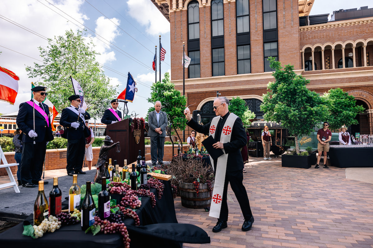 Centuries old blessing led by a priest during the Spring Wine Trail in Grapevine. | Photo by Grapevine CVB