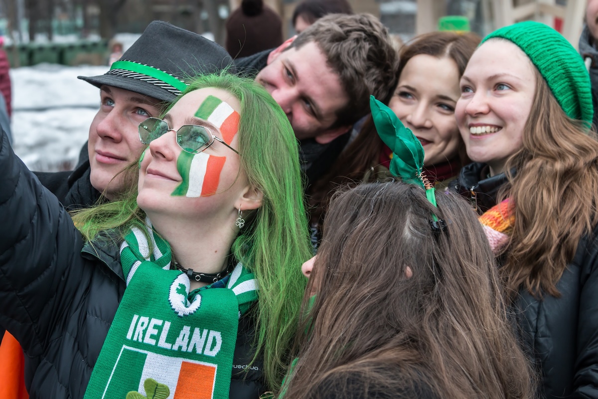 St_patricks_day_parade_stock_by_olegdoroshin_id_122972196_m - DiningOut MOSCOW, Russia - MARCH 16, 2019 Saint Patricks Day celebration in Sokolniki park in Moscow. People walking around and having fun