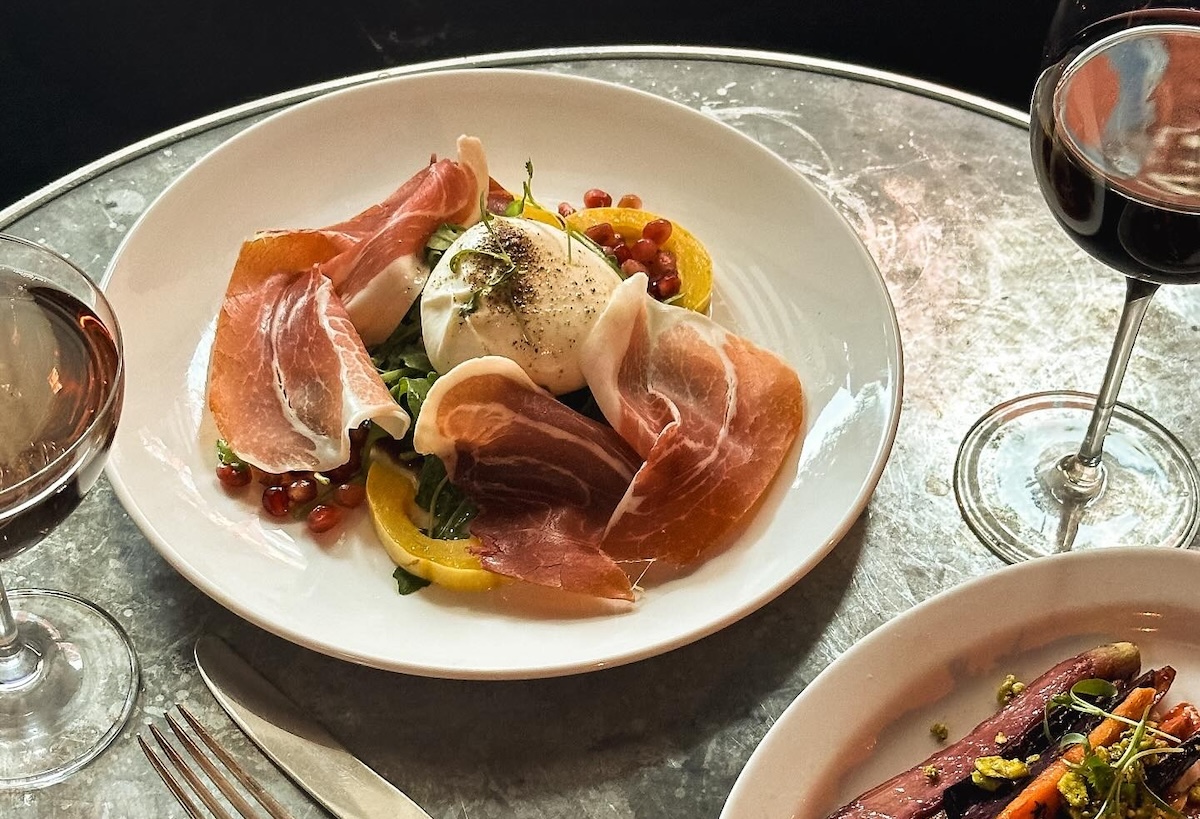 Prosciutto with melon and burrata. | Photo courtesy of Vinateria