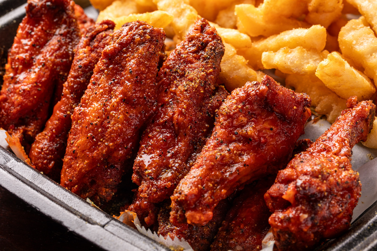 Wings and crinkle cut fries at Hungry AF. | Photo by Hungry AF