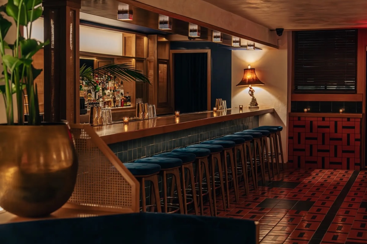 Grab a cozy seat at this hot NYC bar. | Photo courtesy of Dear Strangers