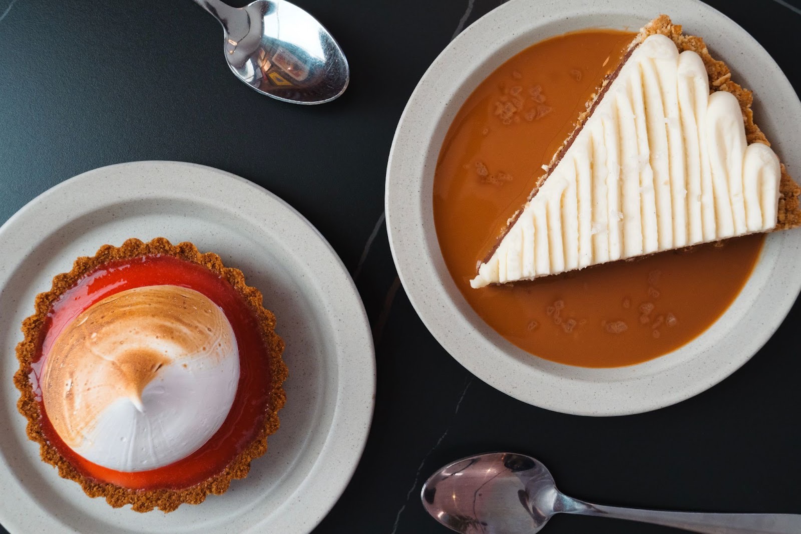 The lime curd tart (left) and chocolate pretzel pie | Photo by Bin 707 Foodbar
