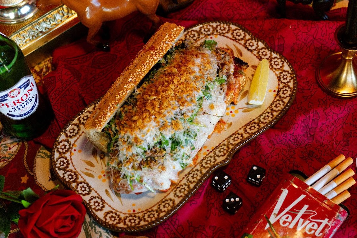 The Hangover Hoagie sports a Caesar salad in sandwich form. | Photo courtesy of Velvet Lasso