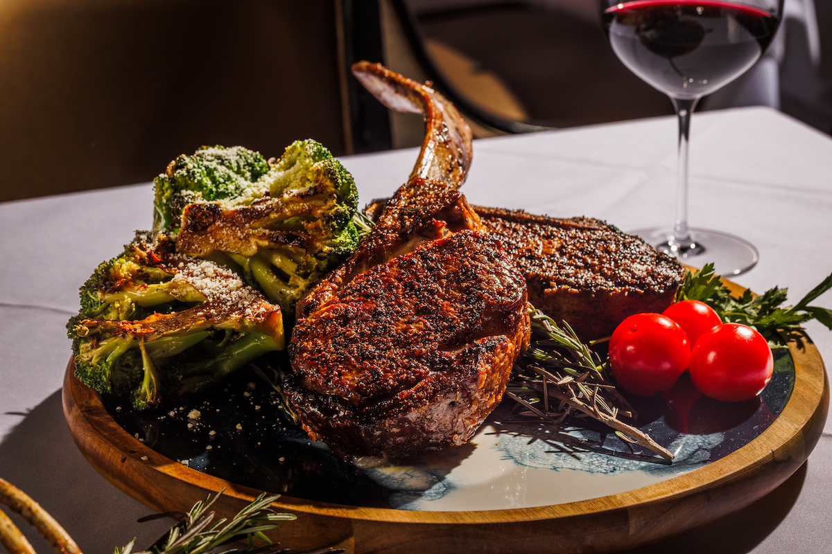 A perfectly seared bone-in ribeye takes center stage at Dee Lincoln Prime. | Photo by S. Reynolds