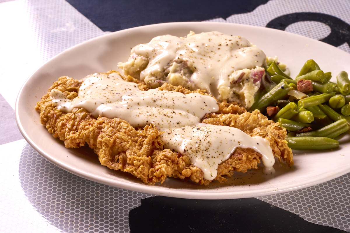 Hand-breaded chicken fried steak with mashed potatoes and green beans at Cotton Patch Cafe. | Photo by Cotton Patch Cafe