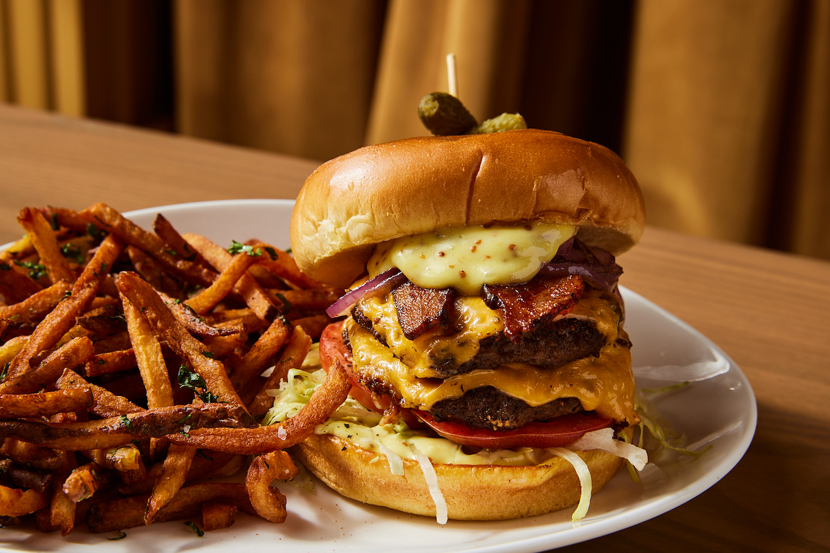 Sky high bacon cheeseburger at Brasserie Margot at Four Seasons Hotel Atlanta. | Photo by Kathryn McCrary