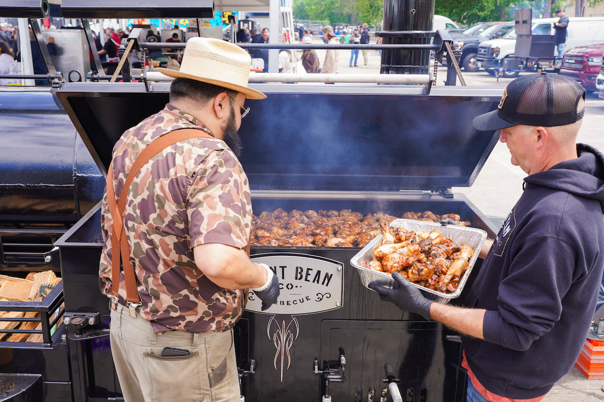 The team at Burnt Bean Co. smoking chicken at the Houston BBQ Festival. | Photo by Robert Lerma