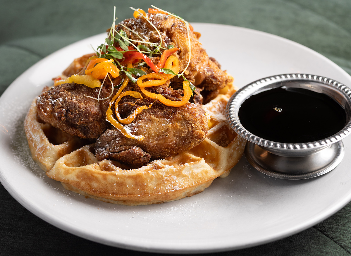 Chicken and waffles at Atrium. | Photo by Oliva Restaurant Group