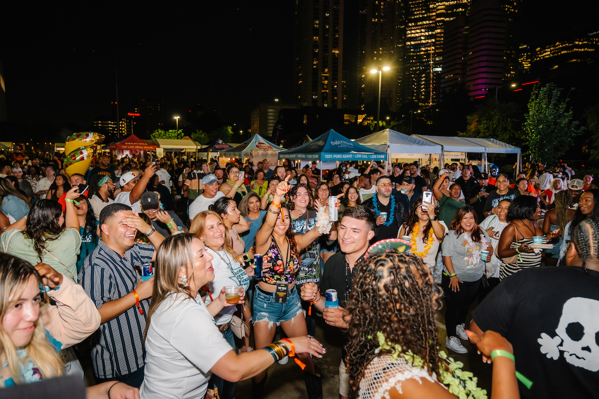 DSCF1052 - DiningOut Festival attendees enjoy live music and entertainment into the night at Top Taco Houston. | Photo by Swizzle Media LLC