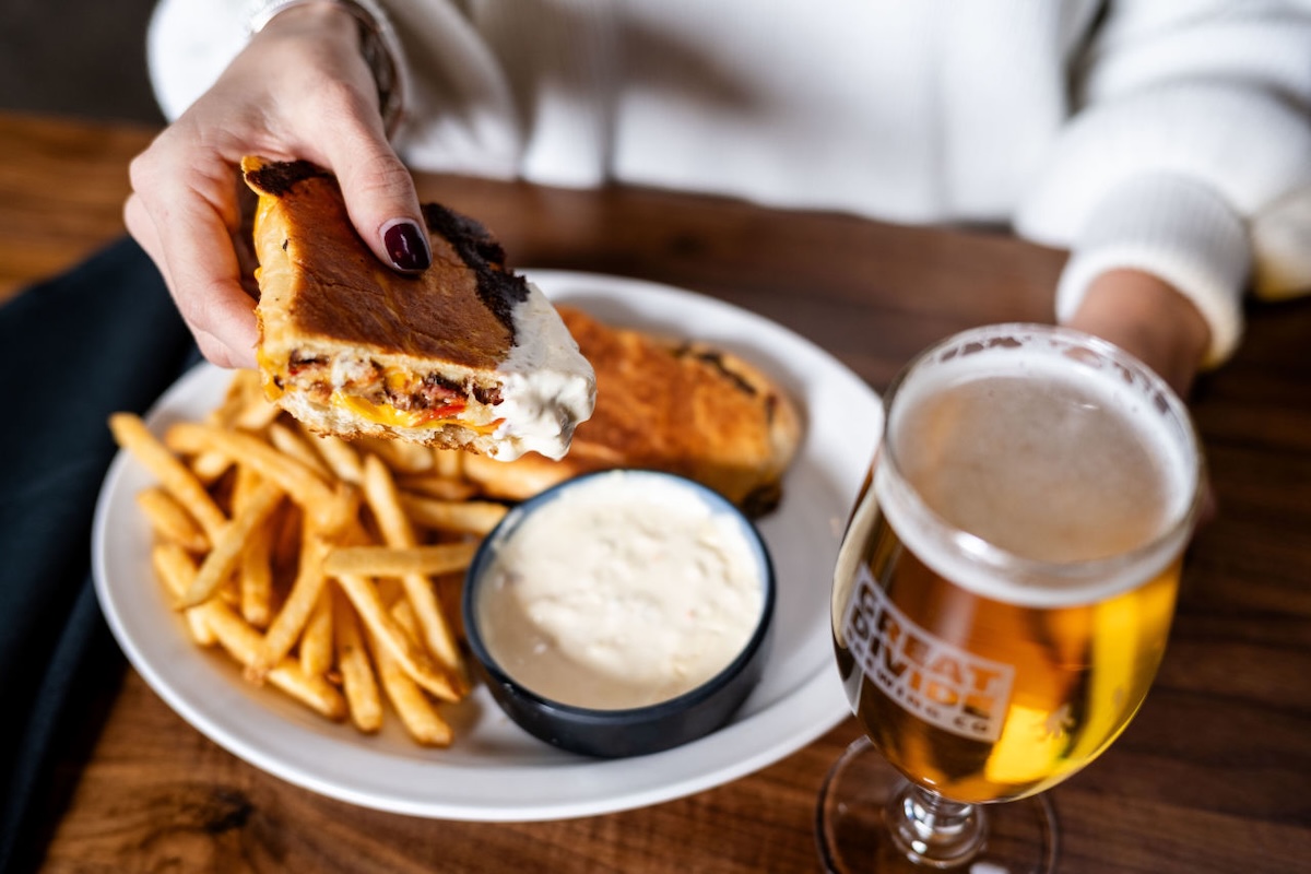 Denver_Great_Divide_Philly Cheesesteak Panini with Queso Dip - DiningOut The Philly Cheesesteak Panini with queso dip. | Photo courtesy of Vibe Concepts