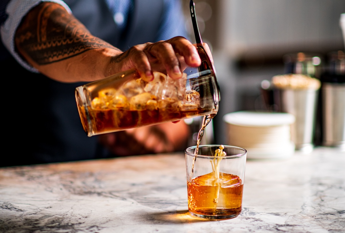 Miguel Munoz pouring a Wild Mushroom at Altair. | Photo by Nicholas Lee Ruiz