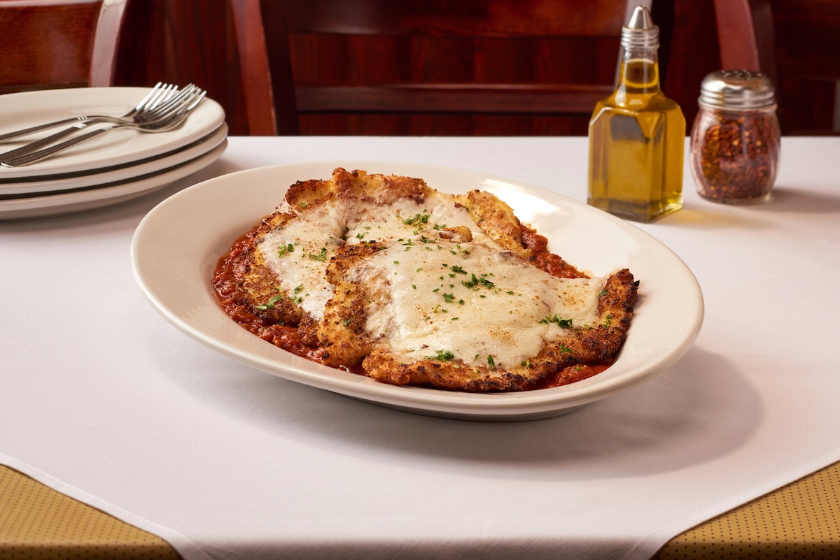 NYC_Carmine_s Chicken_Parmigiana_by_Carmines - DiningOut Classic red sauce dishes abound at this popular Italian restaurant. | Photo courtesy of Carmine’s
