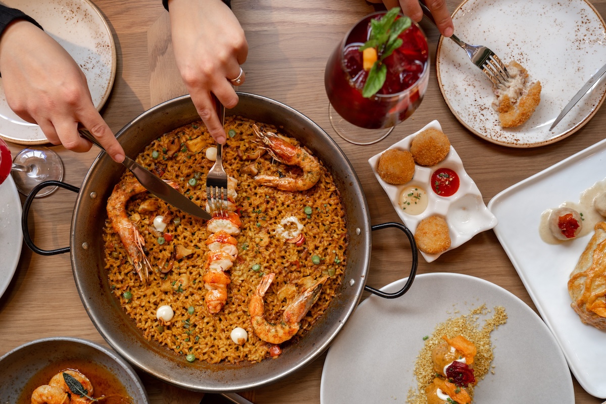 Don't skip on the Paella at this new Spanish spot. | Photo courtesy of Telefèric Barcelona