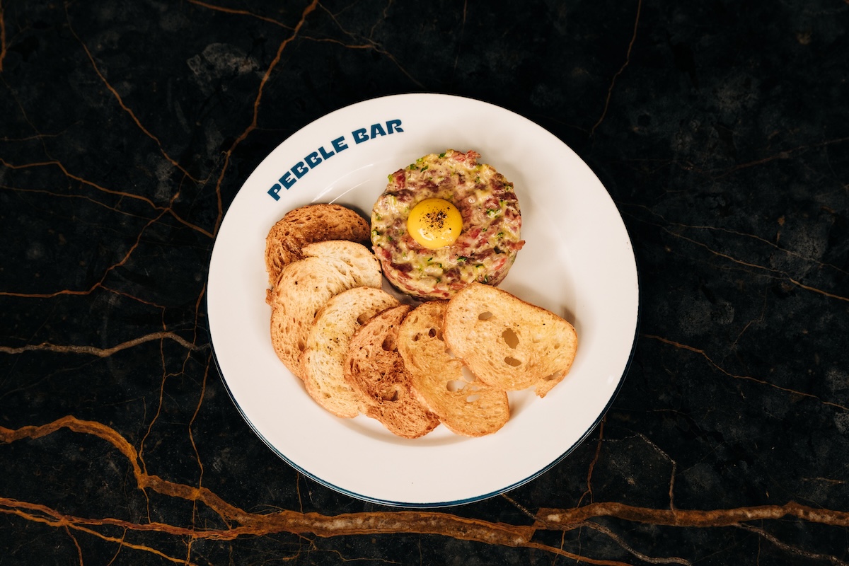 Enjoy steak tartare after seeing a Broadway show. | Photo courtesy of Pebble Bar