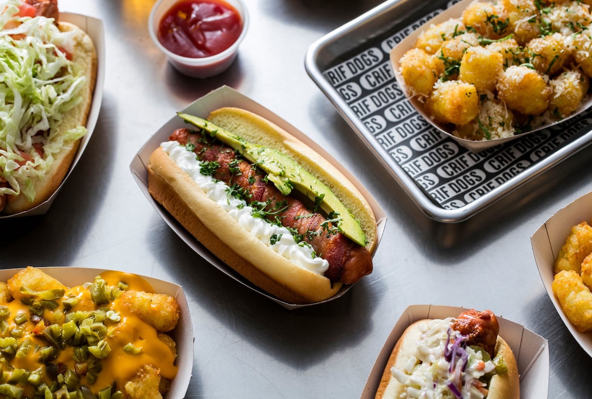 crif_dogs_nyc_food - DiningOut Get a hot dog and tots in the restaurant, or at the bar attached. | Photo courtesy of Crif Dogs