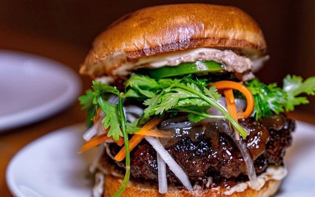 The Bánh Mì Burger is the sleeper menu item. | Photo courtesy of Saigon Social NYC