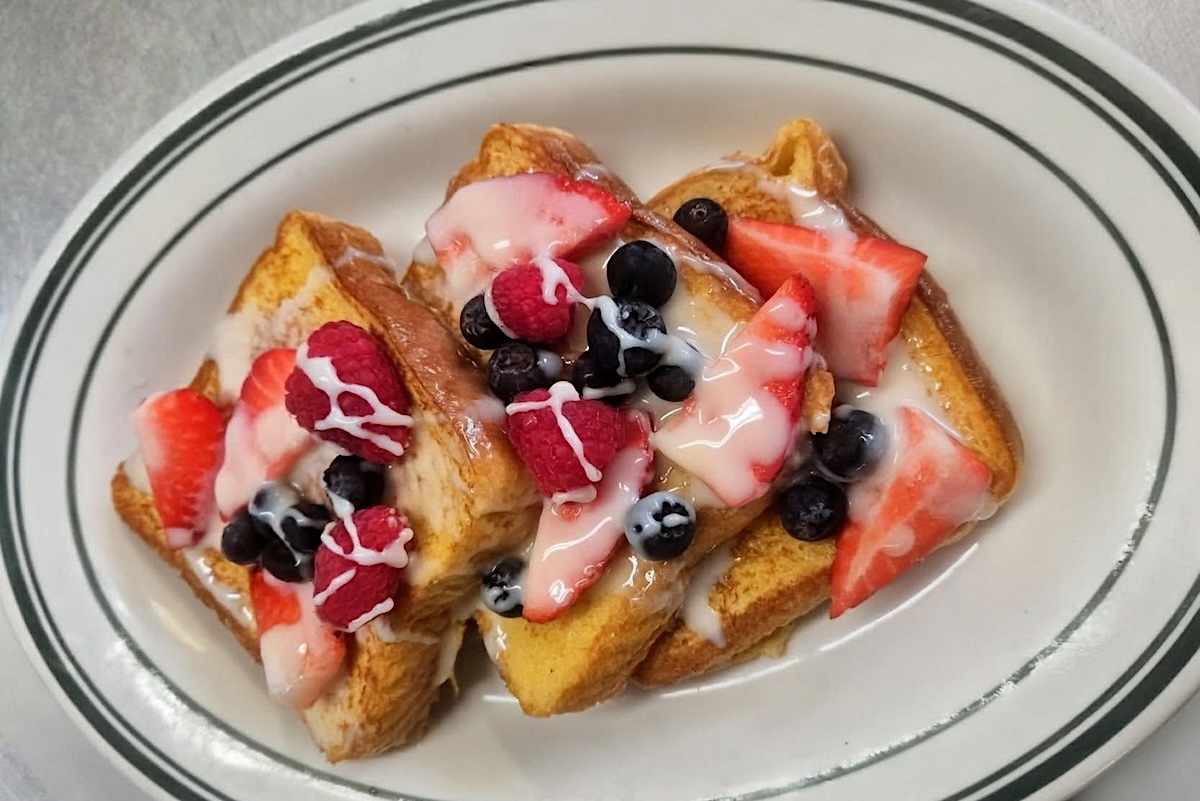 triple berry tres leches french toast_breakfast_palace_denver - DiningOut Triple Berry Tres Leches French Toast. | Photo courtesy of The Breakfast Palace