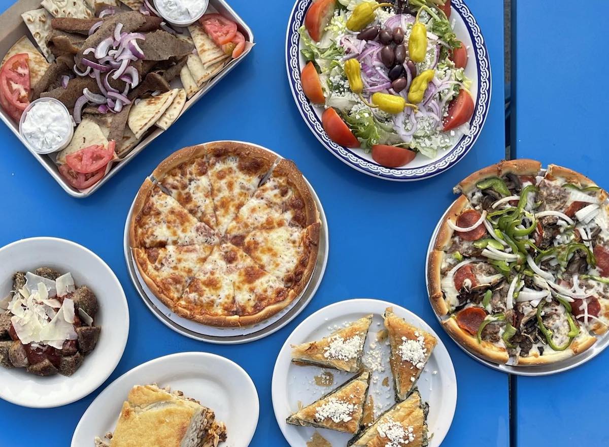 Greek salads, platters, pizza, and dessert at Athens Pizza. | Photo by Athens Pizza