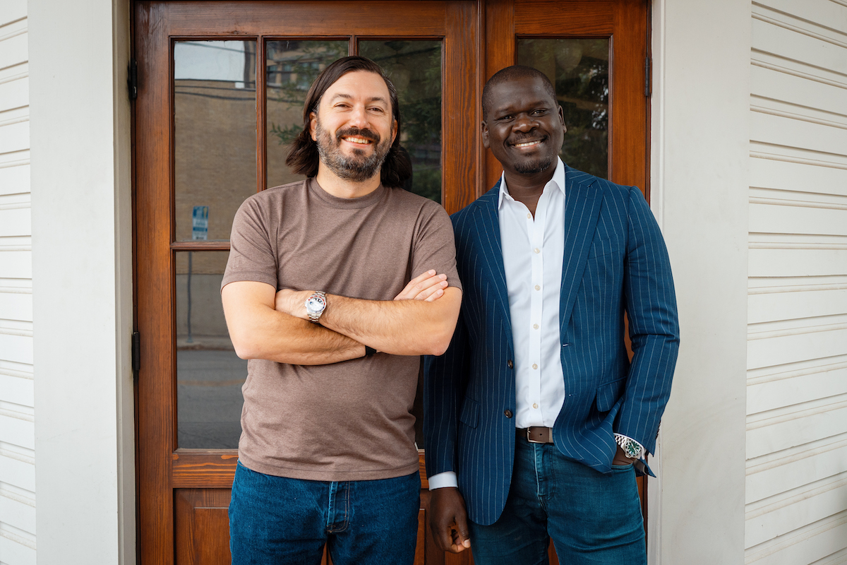 Chef Aaron Bludorn and Cherif Mbodji pose outside of Liberty Saloon building at Pearl. | Photo by John-Paul Garrigues