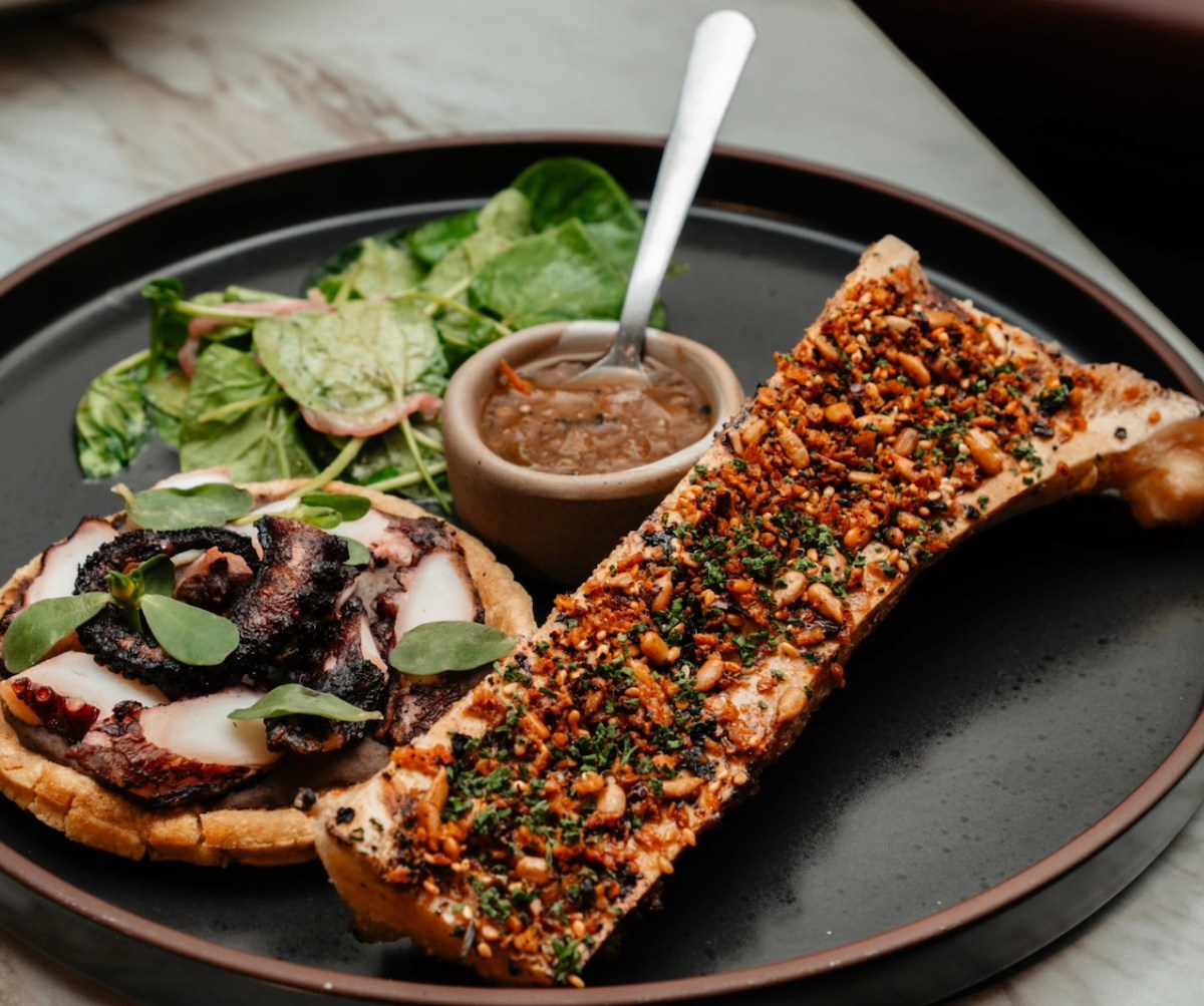 Grilled octopus and bone marrow with refried beans at Belly of the Beast. | Photo by Belly of the Beast