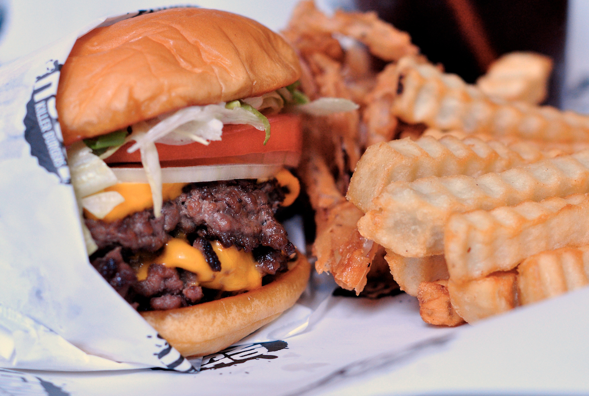 A double cheeseburger and crinkle cut fries at Grindhouse. | Photo by Grindhouse