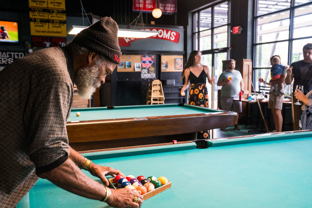 Guests play billiards at Twain’s Brewpub & Billiards, a longtime Decatur favorite. | Photo by INMO
