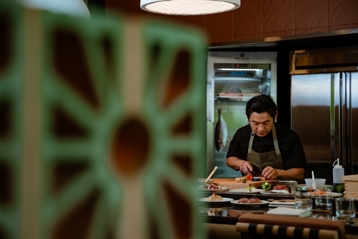 Chef Steven Lee prepares sushi at his new restaurant, Wellness Counter. | Photo by Lucy Beaugard