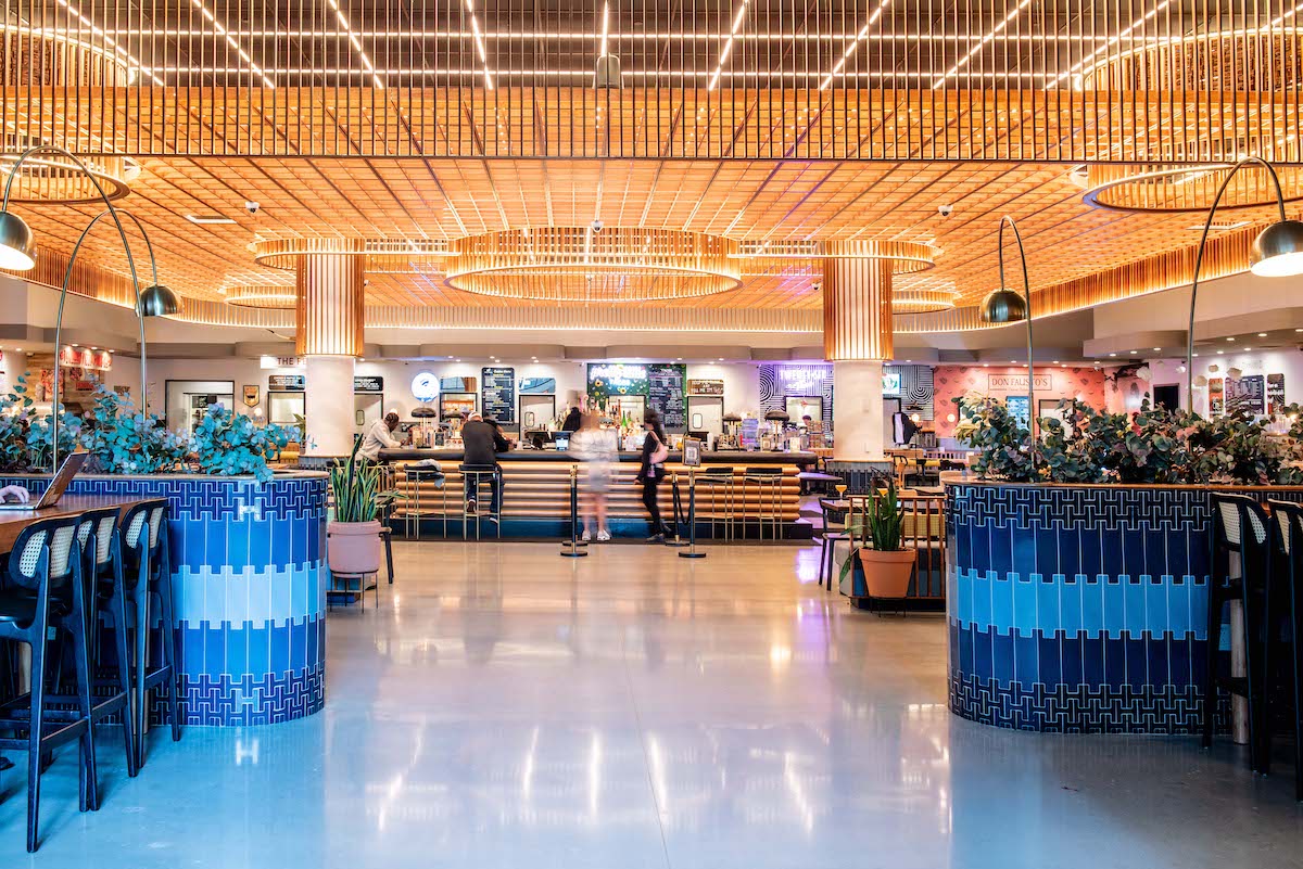 A central bar anchors the expansive space at Politan Row at Colony Square. | Photo by Politan Row at Colony Square