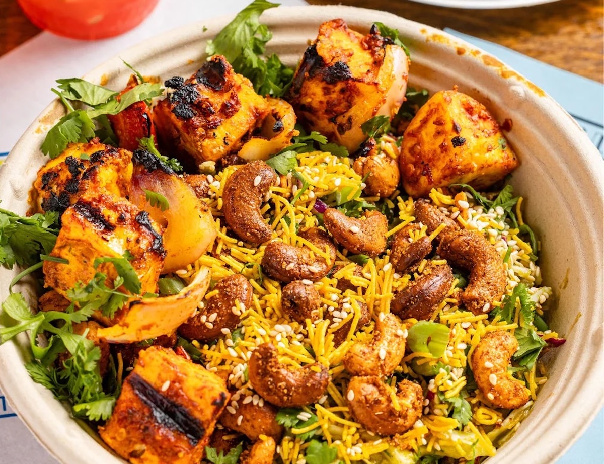 Crunchy sev and spiced cashews bring the heat and the crunch to this flavor-packed salad bowl at Botiwalla. | Photo by Botiwalla